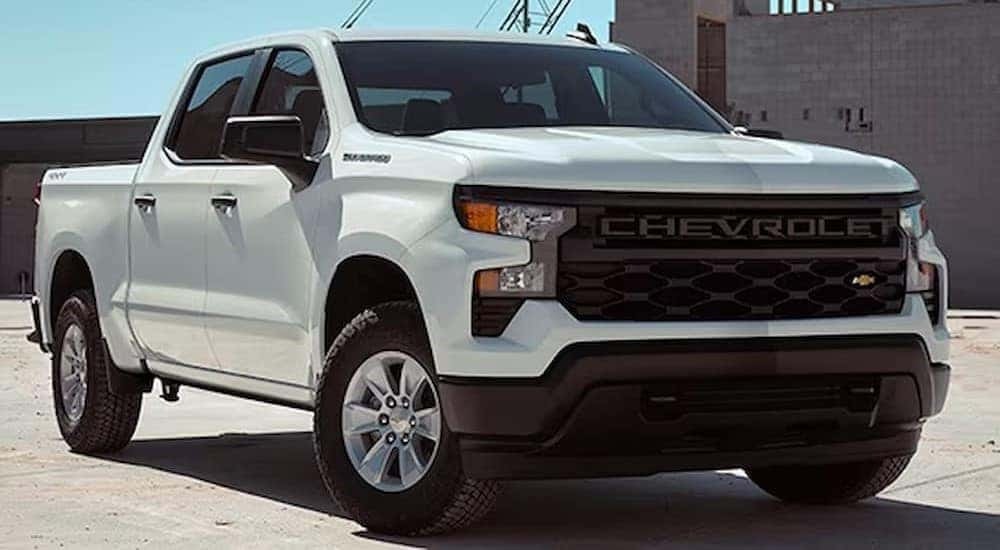 A white 2024 Chevy Silverado 1500 WT is shown parked after visiting a Silverado 1500 for sale near Vestavia Hills.