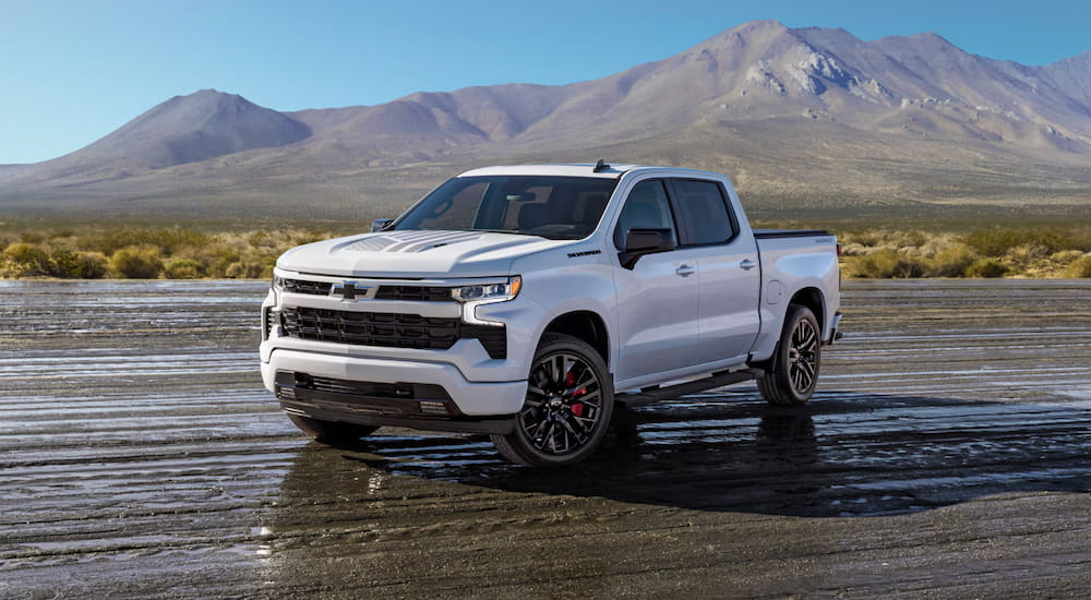 White 2026 Chevy Silverado 1500 parked off-road.