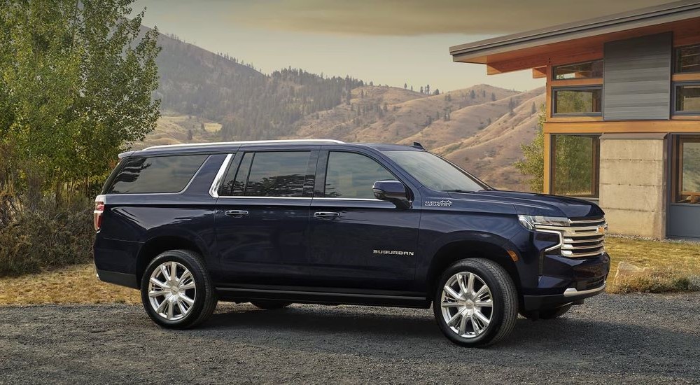 Blue 2023 Chevy Tahoe High Country parked in a driveway