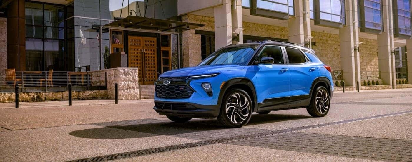 A blue 2025 Chevy Trailblazer RS on a city street
