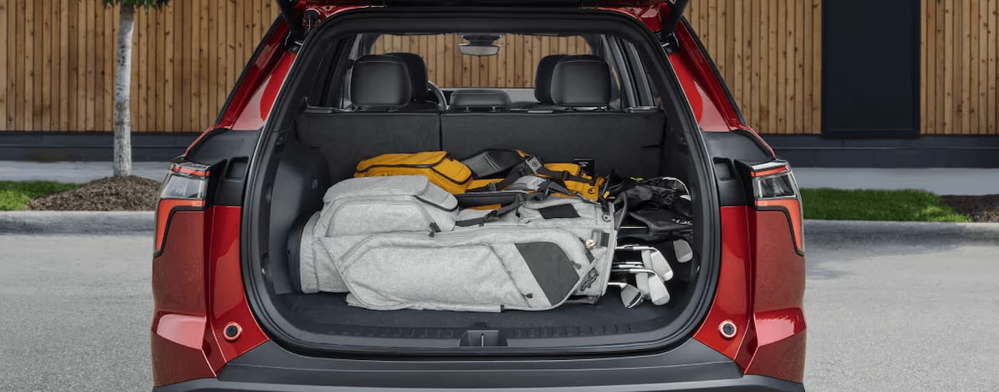 Cargo in the rear of a red 2026 Chevy Equinox