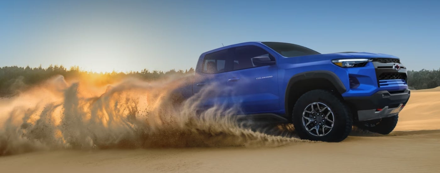 Blue 2026 Chevy Colorado ZR2 drifting on sand