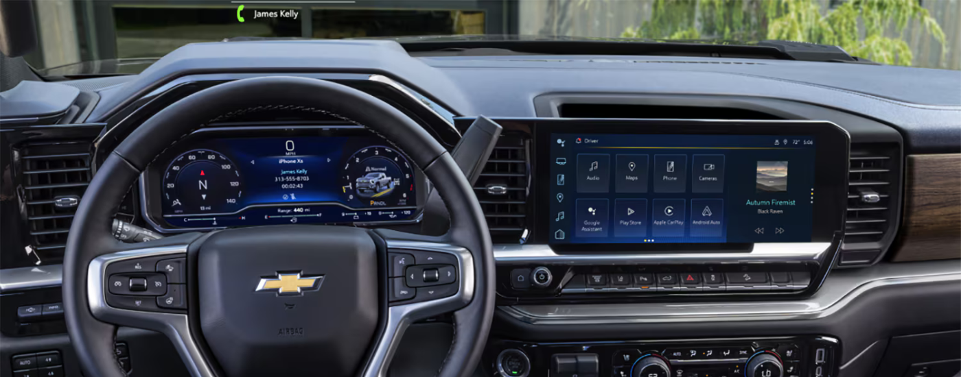 The cabin and dashboard of a 2024 Chevy Silverado 2500 High Country.
