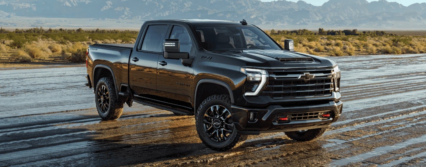 Black 2026 Chevy Silverado 2500 HD for sale parked at an angle