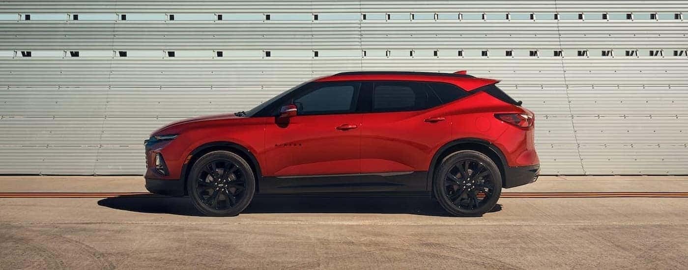 A red 2021 Chevy Blazer RS is shown from the side.