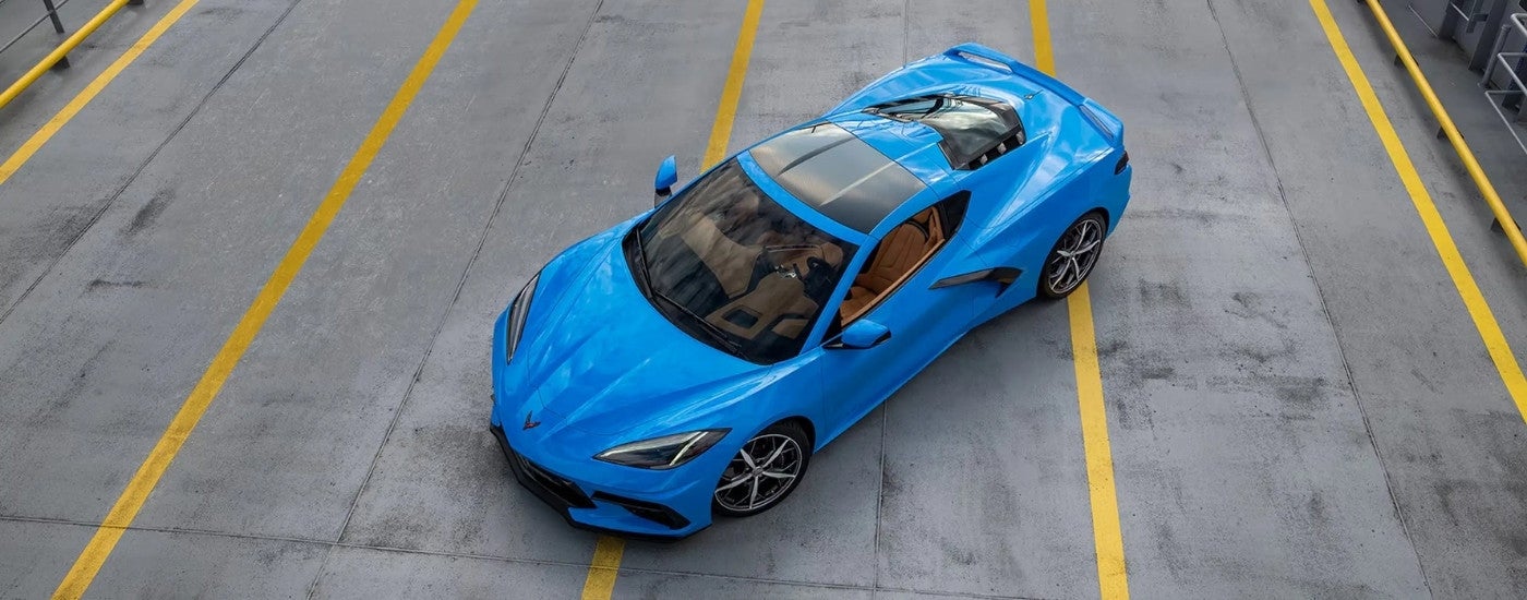 Blue 2021 Chevy Corvette parked on an open track