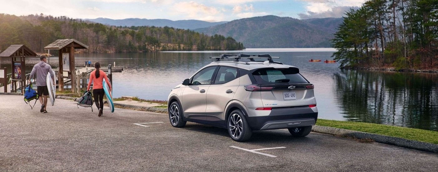 Silver 2023 Chevy Bolt EUV parked near a lake