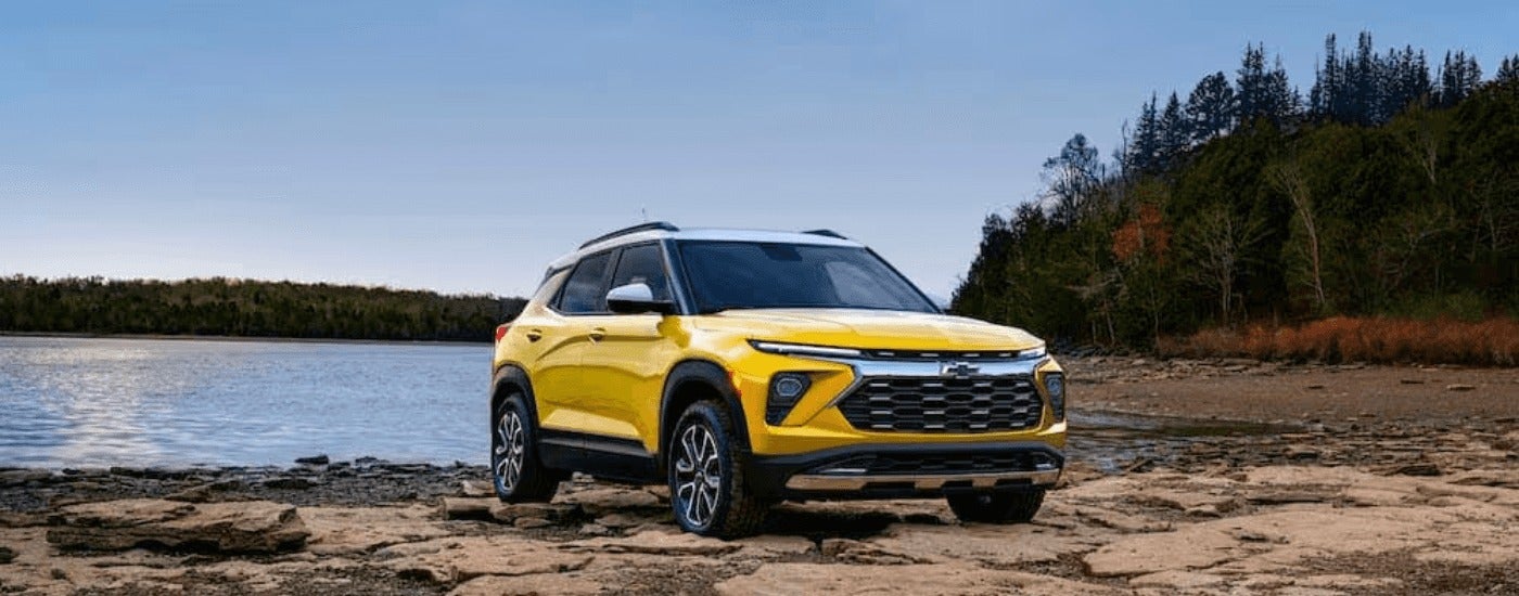 A yellow 2024 Chevy Trailblazer ACTIV is shown from the front at an angle